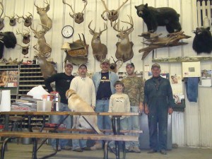 The "game wall" at my dad's shop is a reminder of his hunting passion. He's far right. The fellowship of family trumped the hunting later in his outdoor hobby