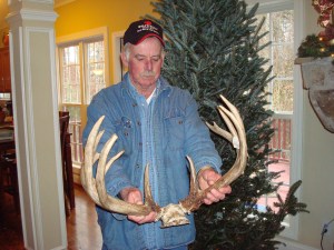 Dad admiring my 2010 Illinois buck while on a visit to our house.